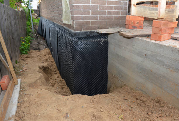 Happy homeowners after waterproofing job in Lindenhurst
